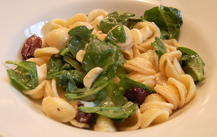 Spinach is a delightful addition to pasta dishes, especially when lightly cooked and accompanied by herbs and spices.