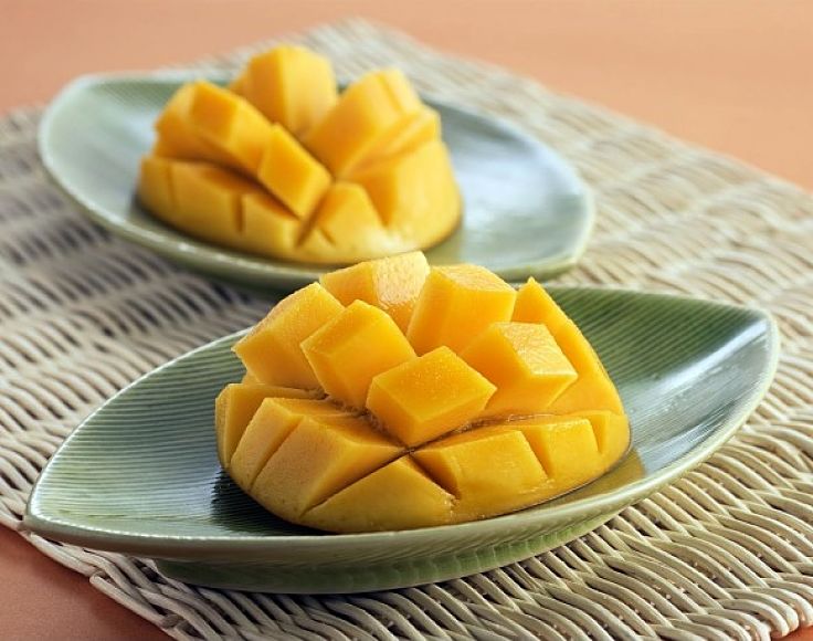 Learn how to quickly and easily cut the mango flesh away from the seed - see this article to learn how to do it