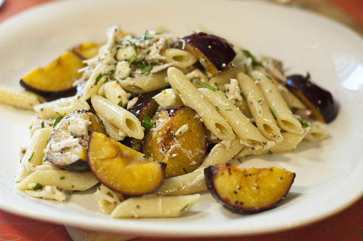 Delicious Pasta Salad with plums, blue cheese, parsley, chives, basil, and grilled chicken pieces