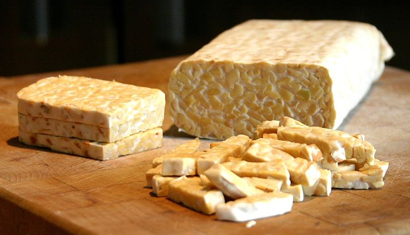 Tempeh is firmer than tofu. It is not as versatile, but is probably healthier as it is a fermemated product 