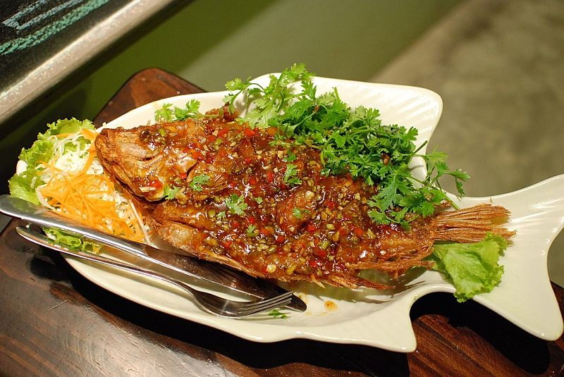 Deep fried Thai fish dish made with a sweet, spicy, tangy sauce with tamarind, chillies and garlic.